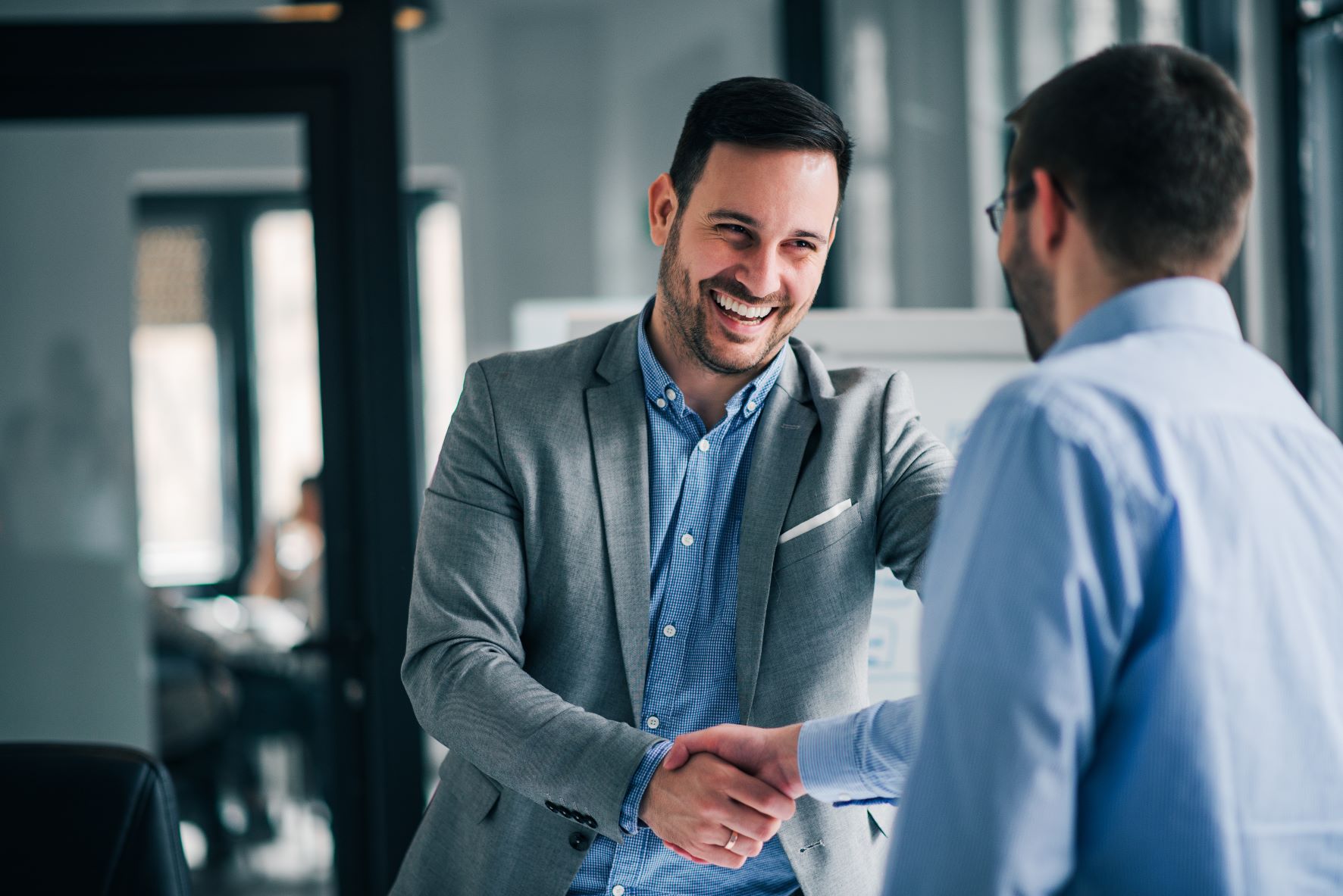 businessmen shaking hands medium