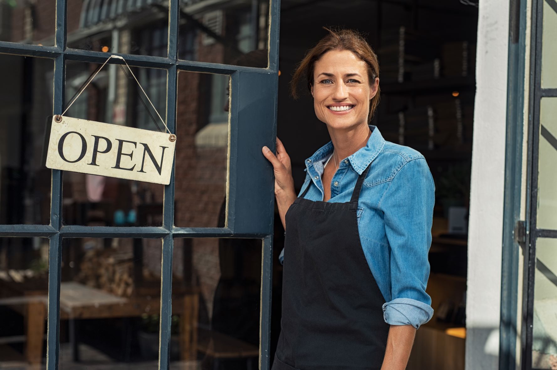 woman businessowner open smiling medium