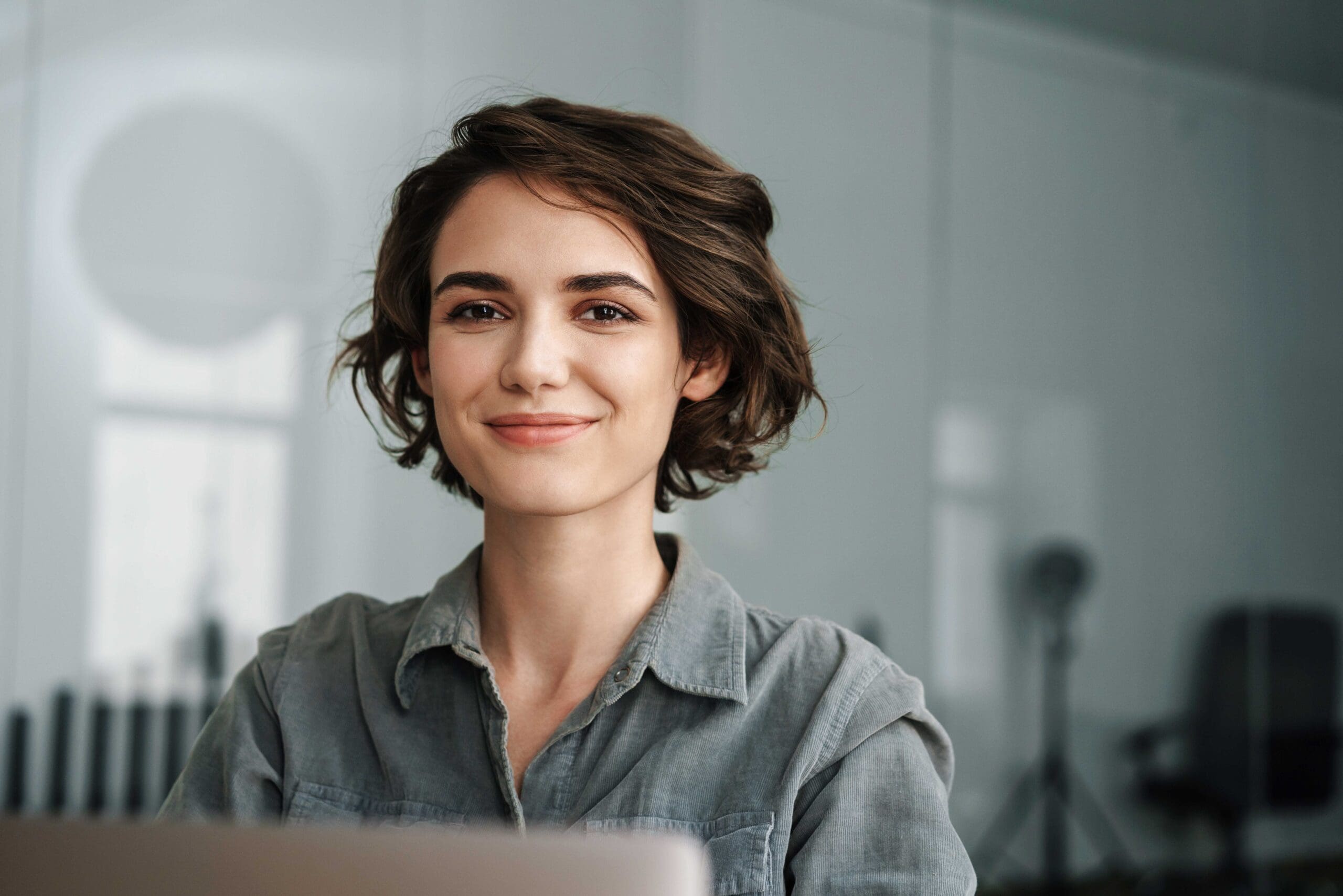 young female in office environment medium scaled