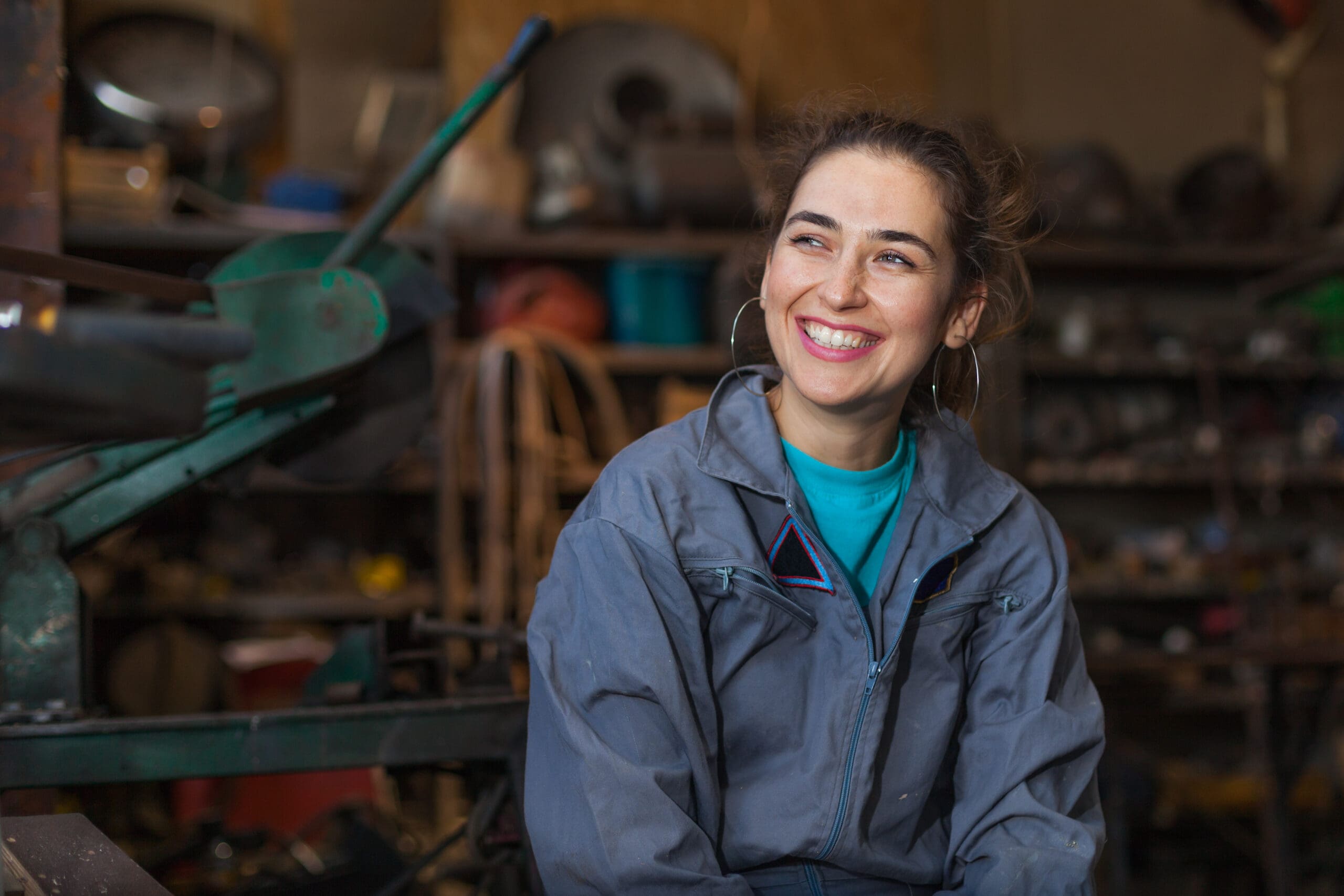 Young,Woman,Mechanic,In,A,Workshop